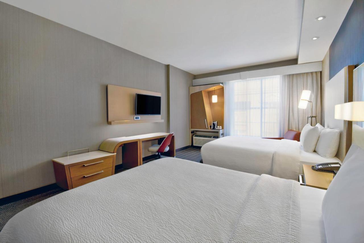 Queen Room with Two Queen Beds and Courtyard View - Hearing Accessible