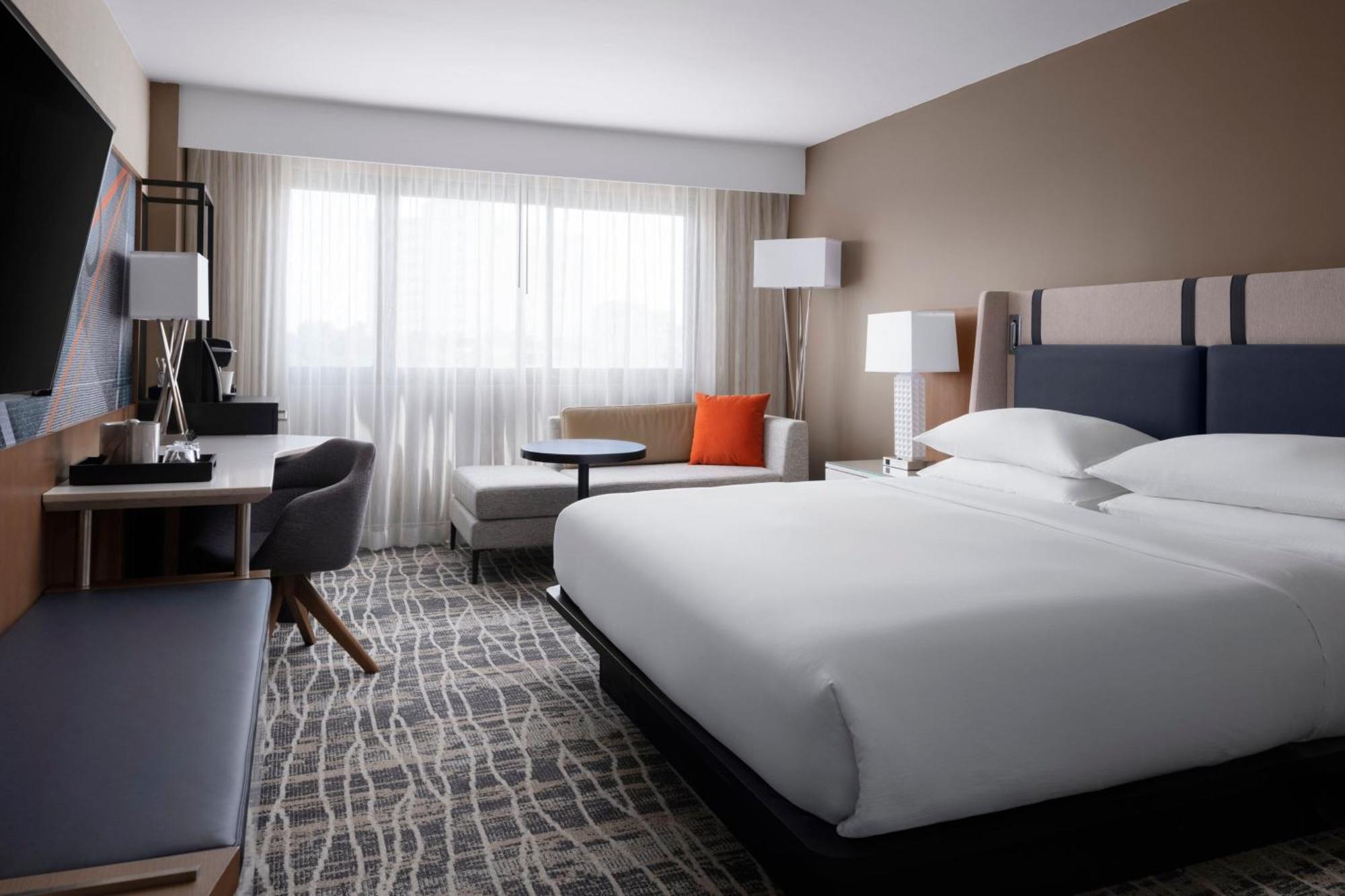 Standard King Room with Roll In Shower and City View - Mobility and Hearing Accessible